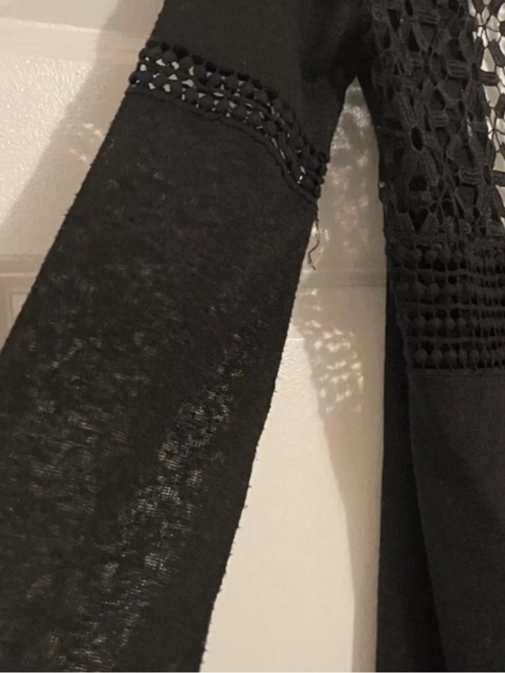 Whimsical black crochet duster sweater